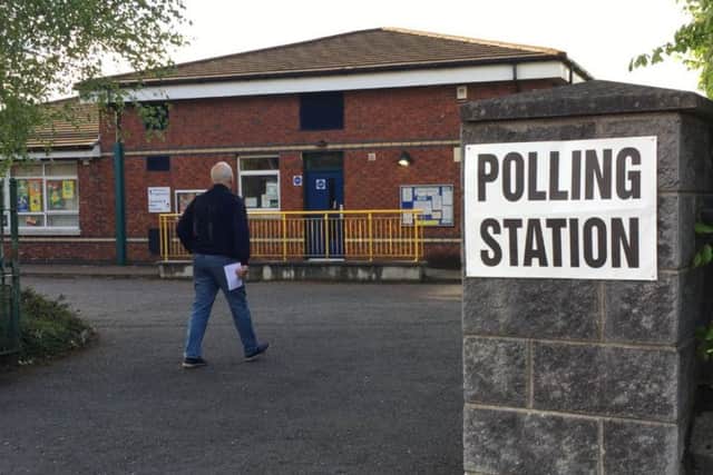 A voter at Belmont Primary School poling station, east Belfast PRESS ASSOCIATION Photo. Picture date: Thursday May 2, 2019. A total of 819 local government election candidates are standing across 11 council areas. See PA story ULSTER Poll. Photo credit should read: David Young/PA Wire