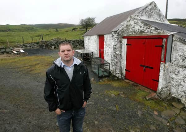 Sammy Heenan, at his remote farm in the hills in Co Down  where his father was murdered by the IRA in 1985