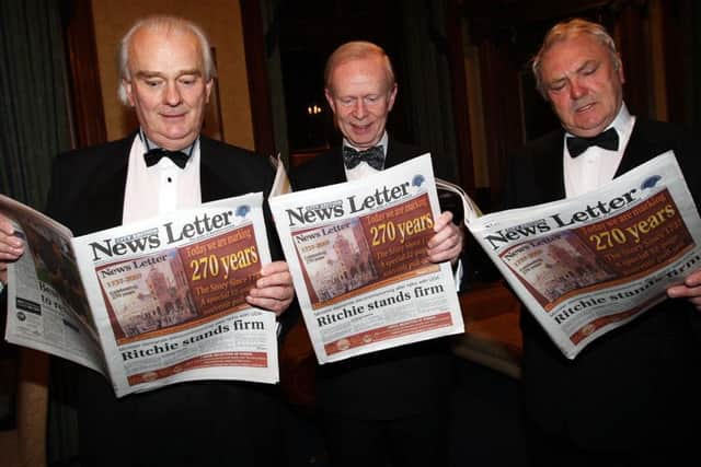 Eoghan Harris, right, with the late Lord Laird, left, and then UUP leader Sir Reg Empey, centre, read a 270th anniversary News Letter at the Reform Club in 2007, the night Mr Harris called on the UUP to form a single party with the DUP