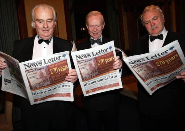 Eoghan Harris, right, with the late Lord Laird, left, and then UUP leader Sir Reg Empey, centre, read a 270th anniversary News Letter at the Reform Club in 2007, the night Mr Harris called on the UUP to form a single party with the DUP