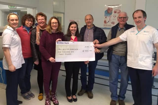 Antrim Chase members present a cheque for £1,003 to team at the Mid Ulster Rehab Centre.