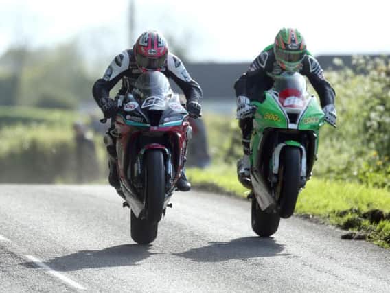 Adam McLean (McAdoo Racing Kawasaki) and Derek McGee (NJ Doyne Kawasaki) in close proximity over the jumps in practice at the Tandragee 100 on Friday. Picture: Stephen Davison/Pacemaker Press.