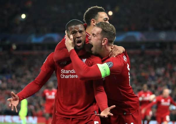 Liverpool's Georginio Wijnaldum celebrates scoring his side's third goal of the game during the UEFA Champions League Semi Final, second leg match at Anfield, Liverpool. PRESS ASSOCIATION Photo. Picture date: Tuesday May 7, 2019. See PA story SOCCER Liverpool. Photo credit should read: Peter Byrne/PA Wire.