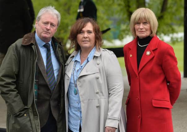 Actor Charlie Lawson with Yvonne Black (widow of murdered prison officer David Black) with Mary Moreland, who is the chairperson of The War Widows' Association. 
Pic Colm Lenaghan/Pacemaker