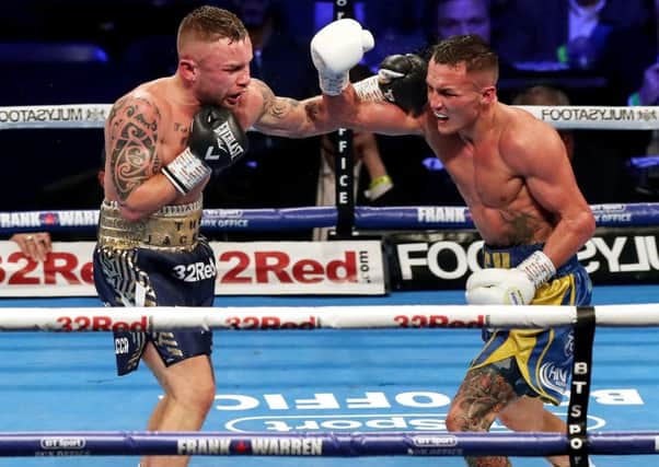 Carl Frampton and Josh Warrington (right) in action in Manchester