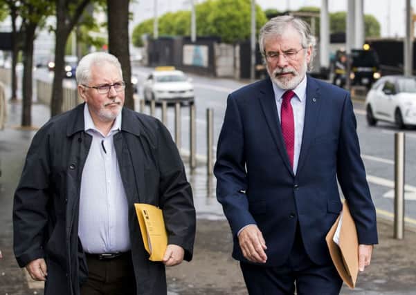 Former Sinn Fein President Gerry Adams (right) with Richard McAuley, arrives at Laganside Court in Belfast to give evidence as the inquest continues into the series of incidents between 9 and 11 August 1971, in which the 1st Battalion, Parachute Regiment killed eleven civilians in Ballymurphy, Belfast. Photo: Liam McBurney/PA Wire