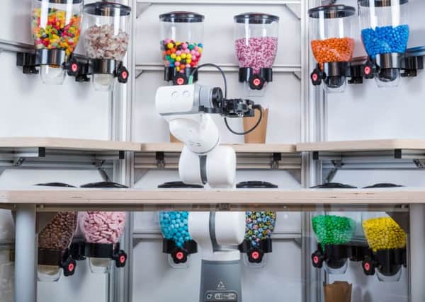 Ocado photo of a more basic Karakuri robot serving sweets, as investors led by Ocado have backed a robotics firm specialising in meal assembly with a funding round worth £7 million
