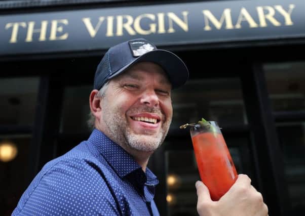 Owner Vaughan Yates outside The Virgin Mary bar in Dublin which opens for the first time on Friday