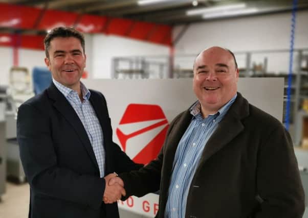 Causeway Aero Group CEO Michael Rice, left, with Rick Crosby of Race Completions