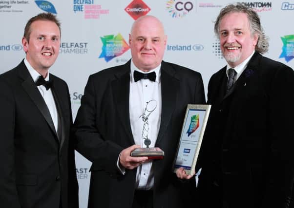 Lifetime achievement award winner Willie Jack, centre, with Michael Stewart of Belfast Chamber, right, and Paul McClurg from Bank of Ireland