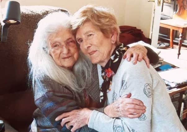 Eileen Macken (right) with her 103-year-old mother Elizabeth who she has met for the first time. Pic: Liveline on RTE Radio 1/PA Wire