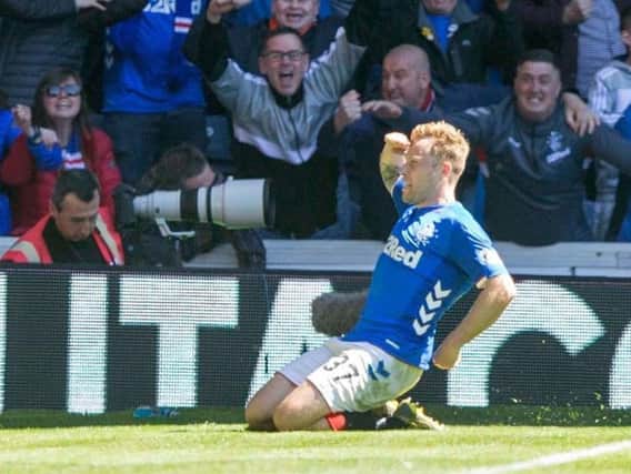 Rangers Scott Arfield celebrates scoring his side's second goal of the game. Photo credit: Jeff Holmes/PA Wire.