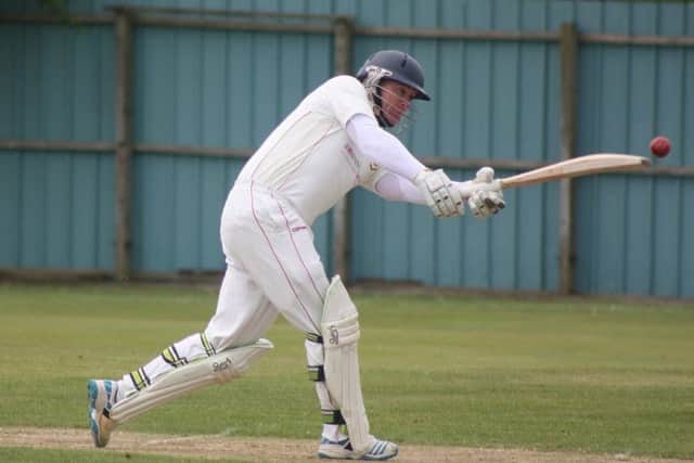 Brigade's Gareth McKeegan on the attack.
