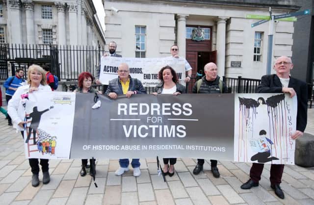 Campaigners for historical institutional abuse outside the High Court in Belfast last September ahead of a challenge to the secretary of state for Northern Ireland