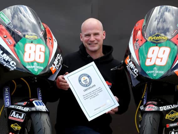 Ryan Farquhar with his Guinness Book of World Records certificate acknowledging his feat of winning more road races than any other competitor ever. Picture: Stephen Davison/Pacemaker Press.