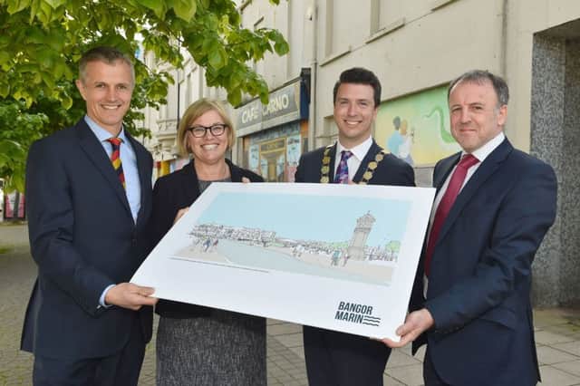 Bangor Marine has been appointed as the developer to take forward a major £50million regeneration project at Queens Parade, Bangor. Pictured at the announcement today are Aran Blackbourne, MD of the Karl Group, Tracy Meharg, Permanent Secretary for Department of Communities, Mayor of Ards and North Down, Richard Smart and John Wilson, MD Farrans. Photo by Simon Graham Photography