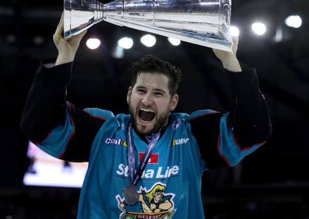 Belfast Giants' Jordan Smotherman pictured with the Elite Ice Hockey League trophy