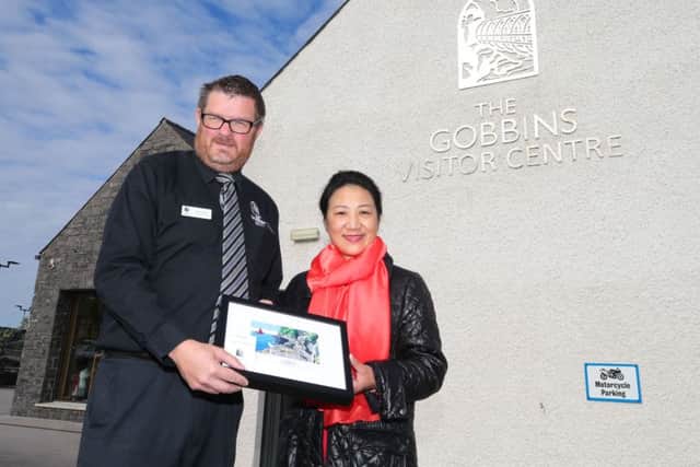 Madame Meifang Zhang pictured with the Manager of The Gobbins, Alister Bell before the tour.