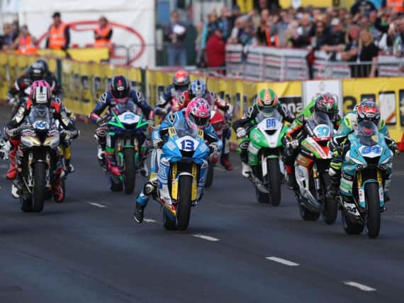 The start of the opening Supersport race at the North West 200 on Thursday, which was won by Lee Johnston (13).