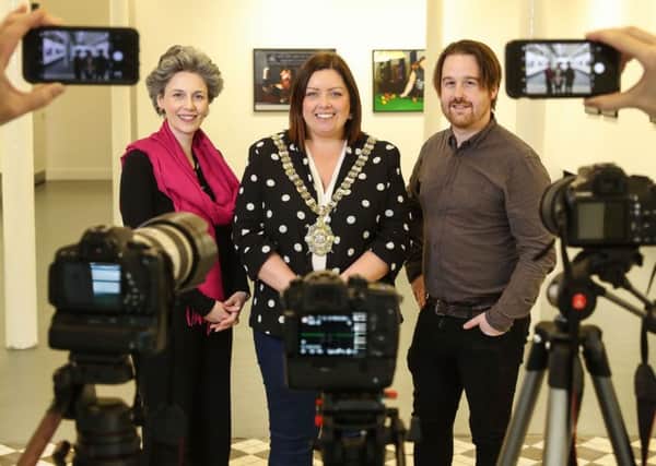 Pictured (L-R) launching the 2019 Belfast Photo Festival are Suzanne Lyle, Head of Visual Arts, Arts Council of Northern Ireland; Belfast Lord Mayor, Councillor Deirdre Hargey and Michael Weir, Belfast Photo Festival Director.