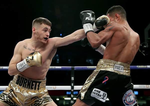 Ryan Burnett (left) won at the Ulster Hall last night after recovering from a back injury