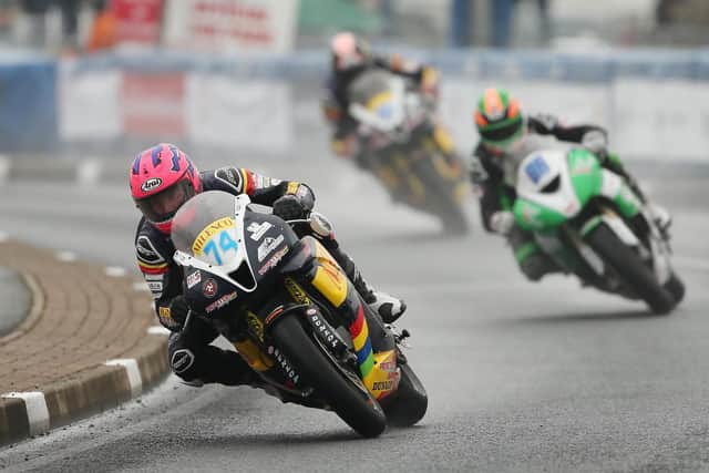 Davey Todd leads Derek McGee and Conor Cummins in the wet Supersport race at the North West 200.