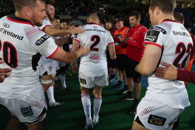 The Ulster team clap Rory Best off the pitch