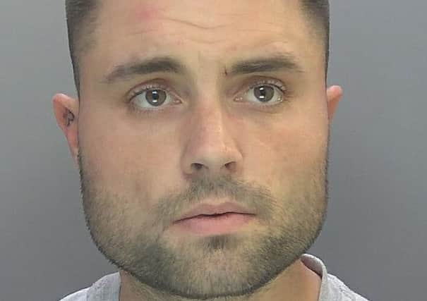 Tommy Whitmore, a drink-driver who drove his pick-up truck the wrong way down a slip road on to a dual carriageway and crashed head-on into a car, killing all three people inside, has been jailed for eight years and four months