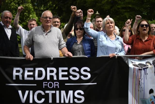 Abuse victims and supporters during their peaceful protest outside the grounds of Castle Coole