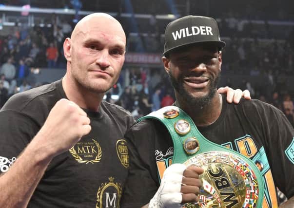 Tyson Fury (left) and Deontay Wilder