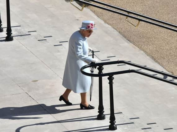 Queen Elizabeth II arrives for a Royal Garden Party at Buckingham Palace in London. Pic: Ben Stansall/PA Wire