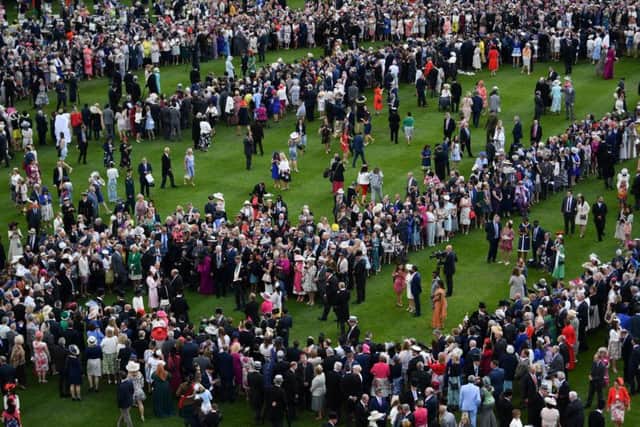 Guests attending the Royal Garden Party at Buckingham Palace in London. Pic: Ben Stansall/PA Wire