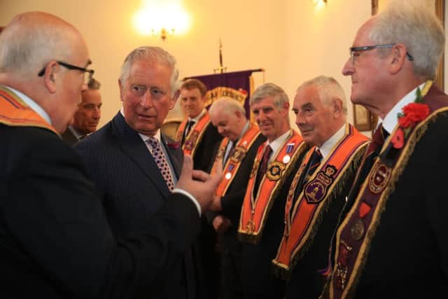 Prince Charles talks to members of the loyal orders during his visit to Brownlow House