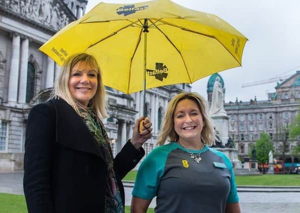 Belfast City Council CEO Suzanne Wylie, left, with EE store manager at Victoria Square Karen Dundas