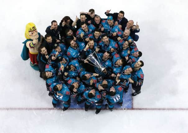 Belfast Giants pictured with the Elite Ice Hockey League trophy
