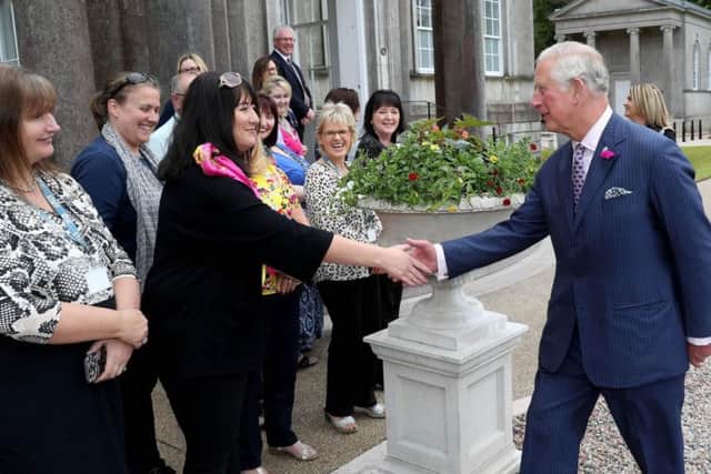 The Prince of Wales is welcomed to the Palace Demesne, Armagh during his two-day visit to Northern Ireland. Photo: William Cherry