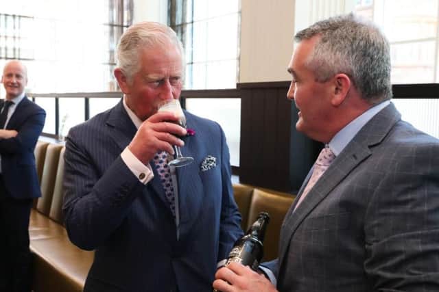 The Prince of Wales with Bernard Sloan from Whitewater Brewery at the Grand Central Hotel in Belfast. Photo by Kelvin Boyes / Press Eye