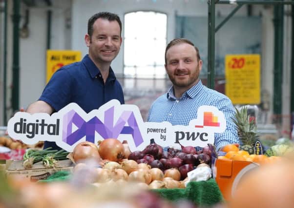 Seamus Cushley, director of ventures and blockchain at PwC, left, with Digital DNA CEO Simon Bailie at St Georges Market, Belfast