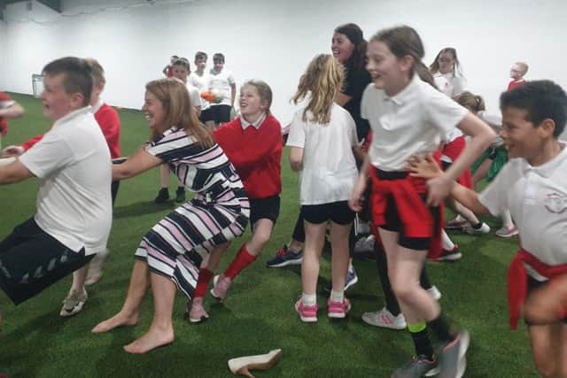 Tullygally PS pupils in a game of Tug of War at Lurgan's Centrepoint
