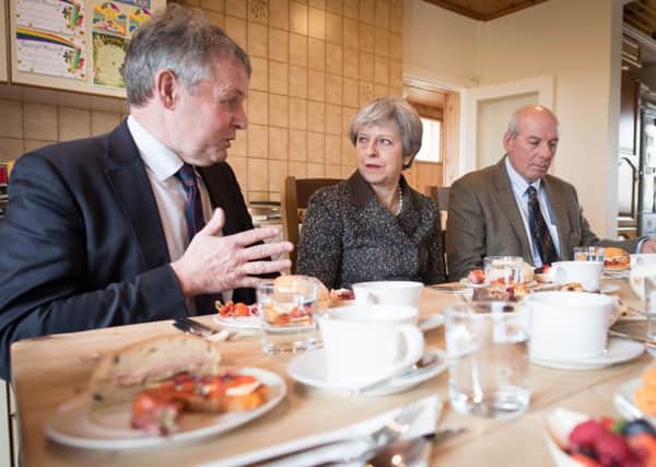 Prime Minister Theresa May having lunch with farmers at Fairview Farm in Bangor, Northern Ireland during a tour of the four nations of the UK, on March 29, 2018. This was one of a number of dates when Ben Lowry interviewed her for the News Letter: Stefan Rousseau/PA Wire