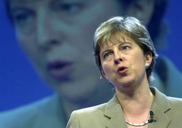File photo dated 02/10/2000 of the then Shadow Education Secretary Theresa May during her speech at the Conservative Party Conference in Bournemouth. The Prime Minister is expected to announce details later today of her timetable for leaving Downing Street. PRESS ASSOCIATION Photo. Issue date: Friday May 24, 2019. See PA story POLITICS Brexit. Photo credit should read: Stefan Rousseau/PA Wire