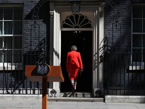 Prime Minister, Theresa May, enters 10 Downing Street after confirming the date she will step down. (Photo: P.A. Wire)