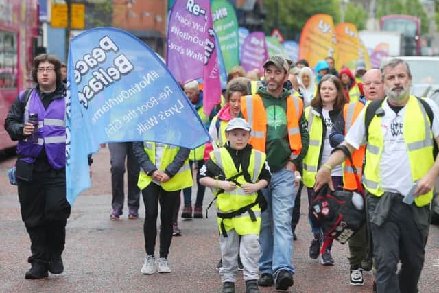 Walking in memory of murdered journalist Lyra McKee. Hundreds of people from all backgrounds set off from Writer's Square on Saturday morning. Pic: Jonathan Porter/PressEye