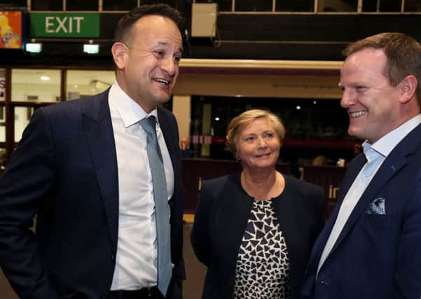 Taoiseach Leo Varadkar (left) with Fine Gael candidate Frances Fitzgerald and Fine Gael's Alan Farrell at the count centre in the RDS, Dublin, on Sunday as counting of votes continues in the European Elections. Photo: Brian Lawless/PA Wire