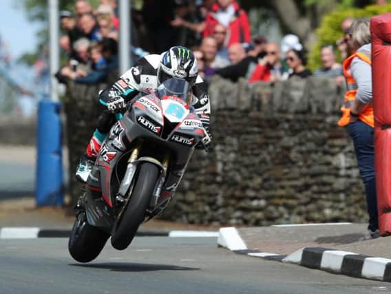 Michael Dunlop on his MD Racing Honda Supersport machine at St. Ninian's during Sunday's opening qualifying sessions at the Isle of Man TT.