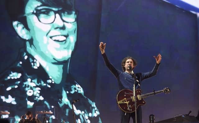 25/5/19: Gary Lightbody, lead singer of Snow Patrol with an image of murdered journalist Lyra McKee on the screen during their Ward Park 3 concert in Bangor. Picture: Michael Cooper