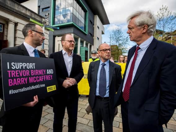 Head of Nations & Regions at Amnesty International UK Patrick Corrigan (left) stands with investigative journalists Trevor Birney (centre left) and Barry McCaffrey (centre right) as they speak with David Davis MP (right) outside Belfast High Court. Pic: Liam McBurney/PA Wire