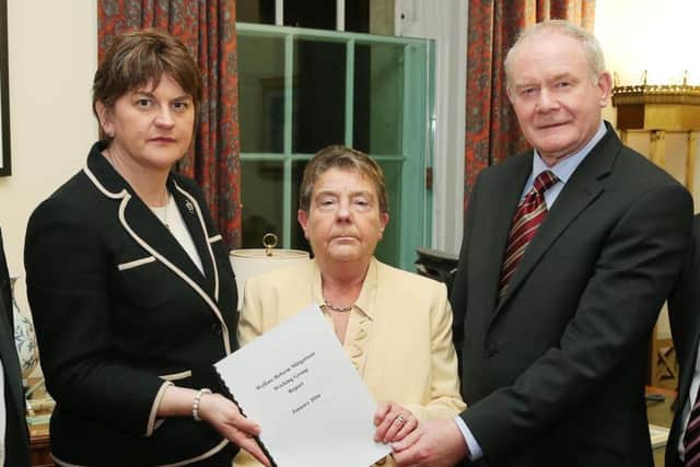 Then first minister Arlene Foster and deputy first minister Martin McGuinness receiving the proposals from Professor Eileen Evason in 2016 on the £585m mitigation package which protects NI from the full brunt of UK-wide welfare reforms until March 2020. Photo: Press Eye, Kelvin Boyes.