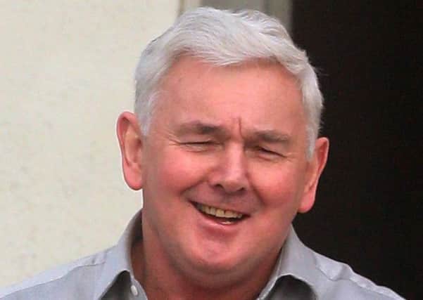 John Gilligan was arrested at Belfast International Airport last August