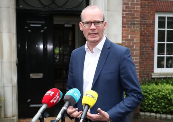 Tanaiste Simon Coveney speaking to the media outside Stormont House as  as attempts to restore power-sharing at Stormont continues.  PRESS ASSOCIATION Photo. Picture date: Thursday May 30, 2019. See PA story ULSTER Politics. Photo credit should read: Niall Carson/PA Wire